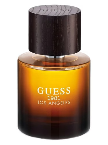 GUESS 1981 Los Angeles men’s fragrance bottle photographed in studio, emphasizing amber glass, minimal typography, and heritage branding