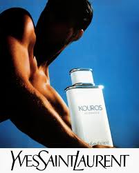Vintage YSL Kouros print advertisement featuring a classical marble bust motif and the Kouros bottle presented as an icon object
